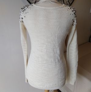 Knit sweater with sequin stones